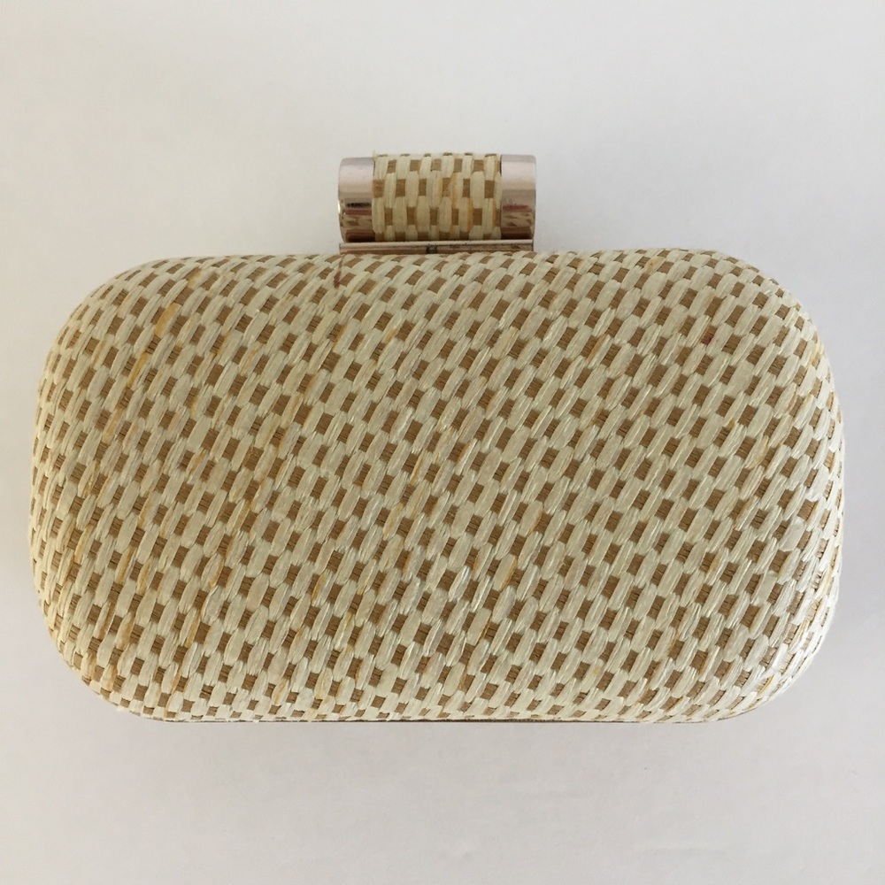 Rose Gold Big Buddha Woven Clutch.