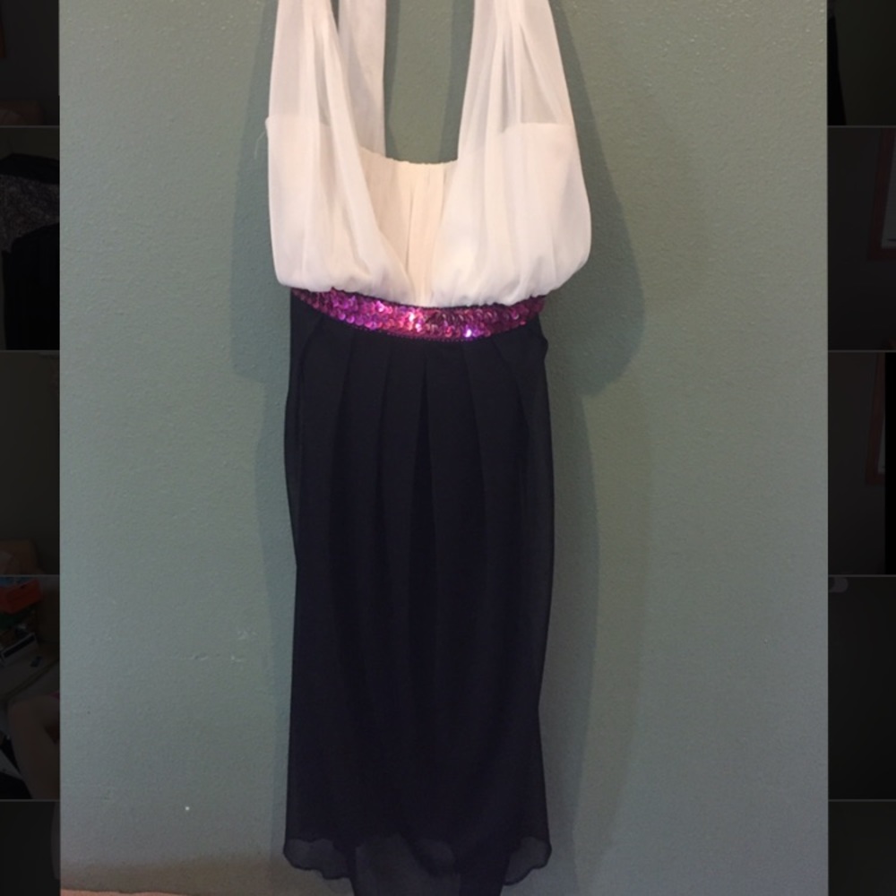 Kids white and black dress with a pink waste band