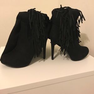 Black fringe heeled boots