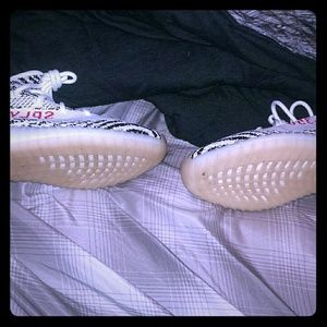 Pair of Zebra Adidas Yeezy Boost V2