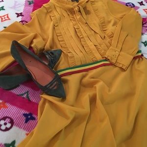 Here is another coveted ELOQUII dress in marigold