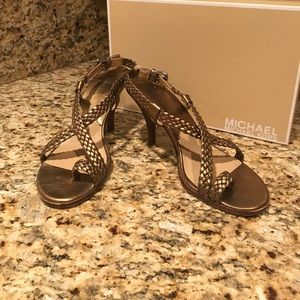 Michael Kors braided bronze sandals.