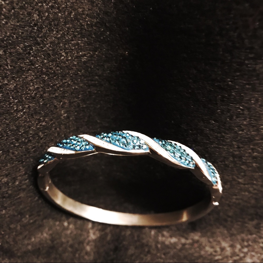 Blue cubic zirconia stones bracelet.