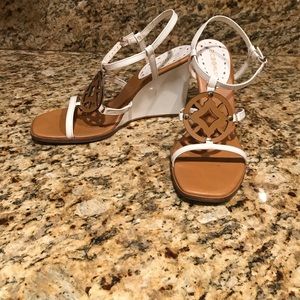 BCBG White patent leather wedge sandals.