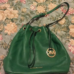 Michael Kors draw string shoulder bag.