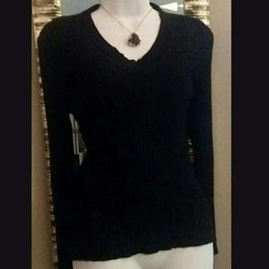 20% off 3+ items; Black ribbed v-neck sweater