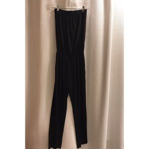 Comfortable black jumpsuit with cinched waist