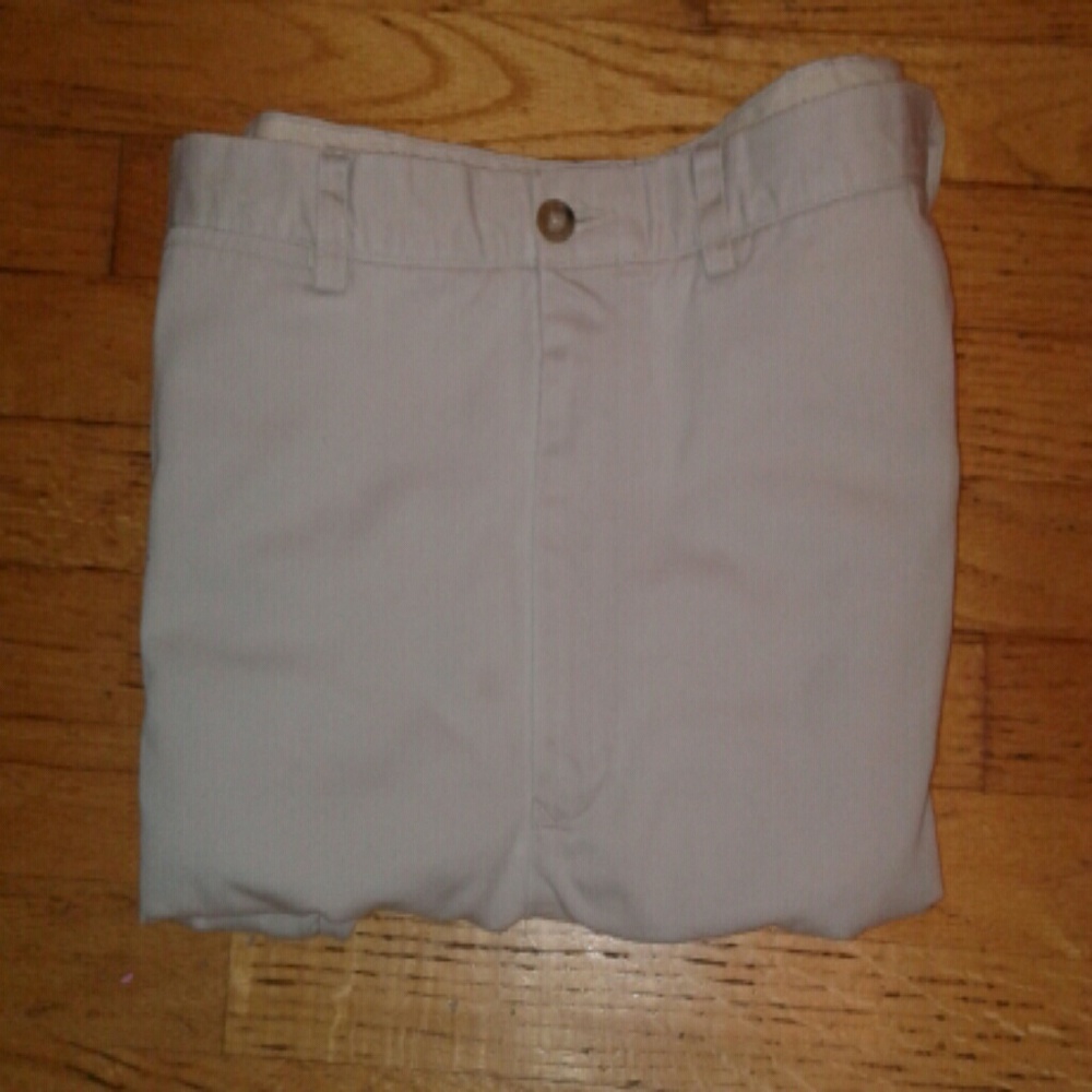 Tan straight leg khakis.