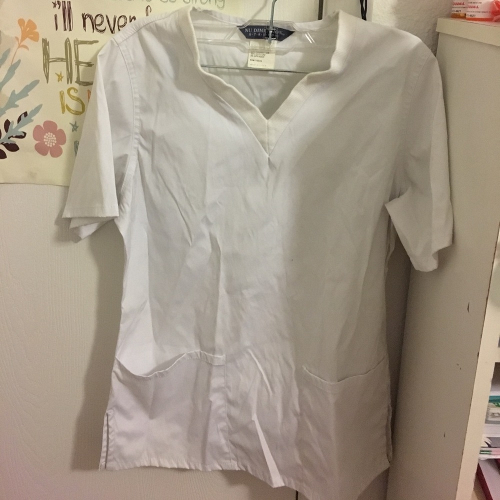 White scrub top with front pockets