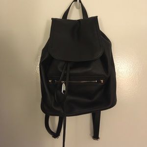Back pack with silver hardware