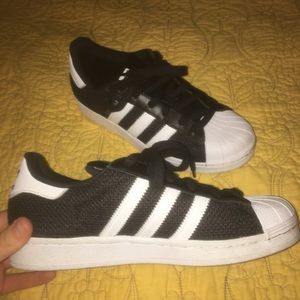 Adidas superstar black and white. size 6. run big.