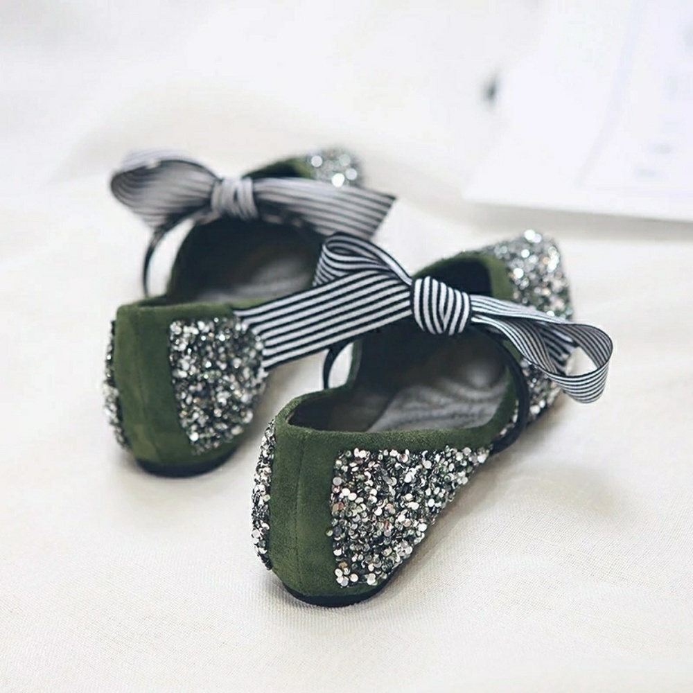 Green bling arrow shaped flat shoes