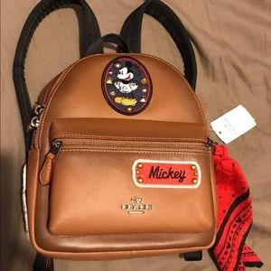 Brand new disney coach mini backpack with tag