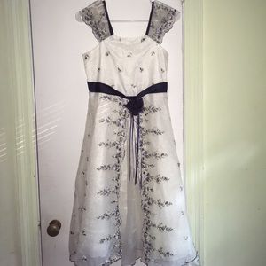 A white dress with flower designs