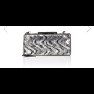 Clutch.sneak-stamped.NEW w/tags.SILVER