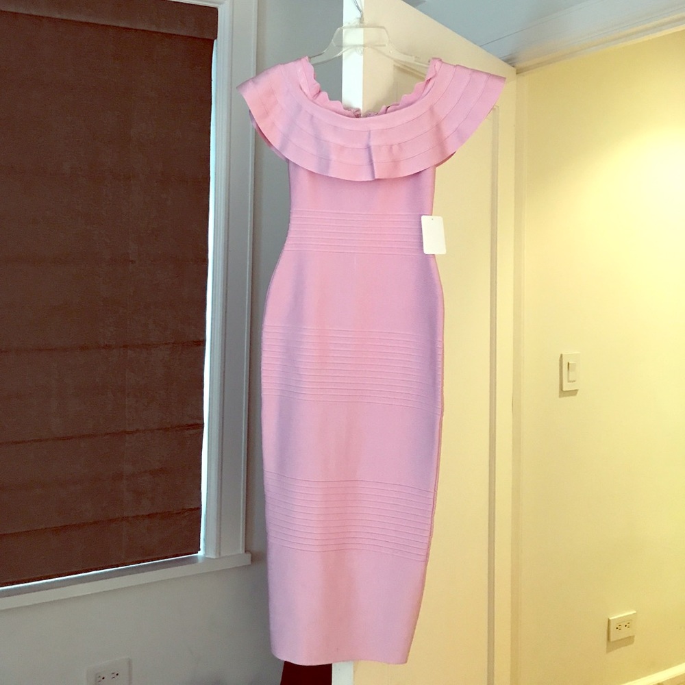 Her junction pink off the shoulder bandage dress