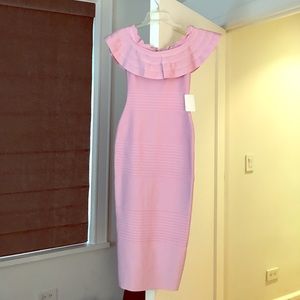 Her junction pink off the shoulder bandage dress