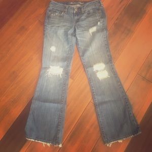 Distressed boyfriend jeans