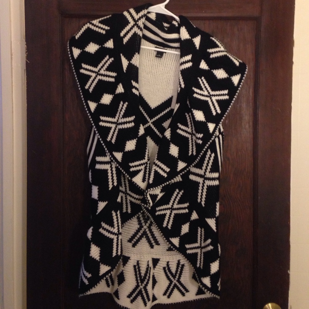 A new direction sleeveless over sweater.