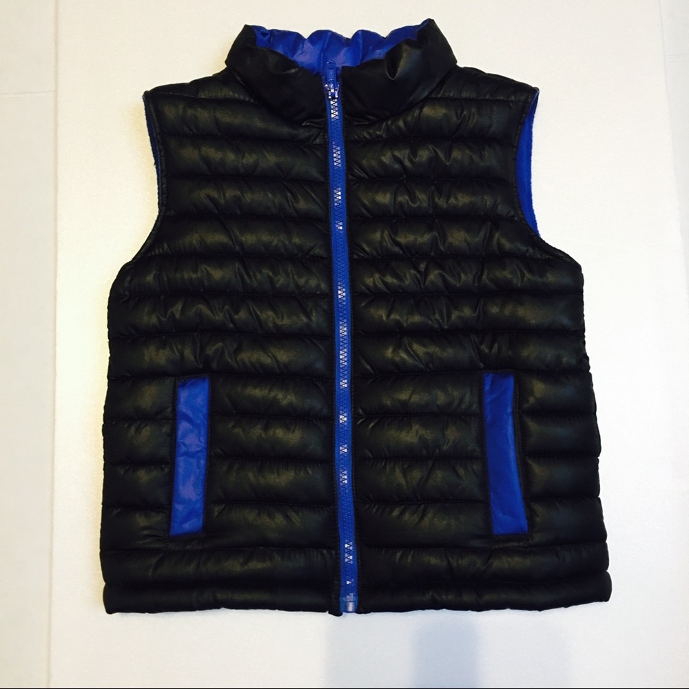 Crazy 8 puffer vest . Boys 5T
Fully lined.