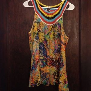 A beautiful multi colored crochet neck top.