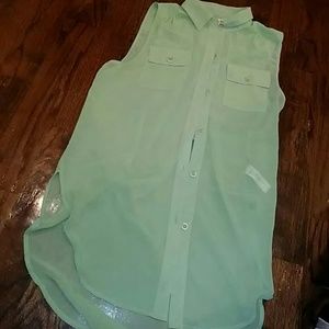 Sheer sleeveless green top