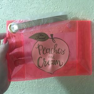 Too faced peaches and cream clutch