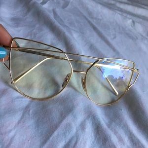 clear lens gold frame glasses