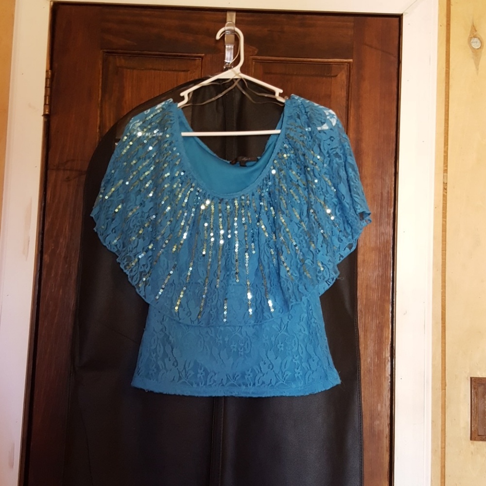 Super cute and lacey blue shirt