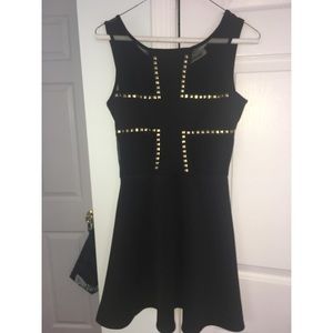 Black skater dress with jeweled cross design