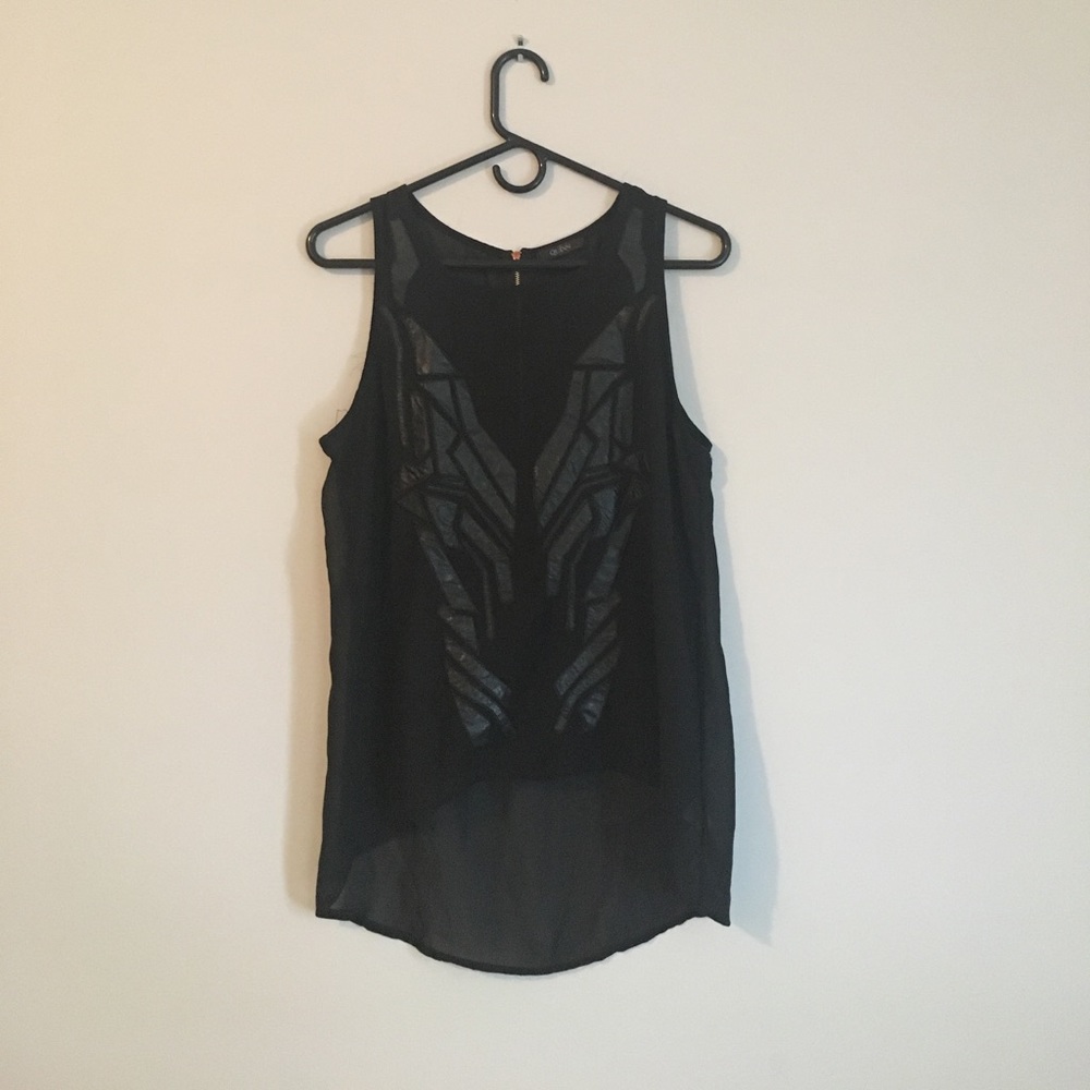 Sheer black top with leather detailing