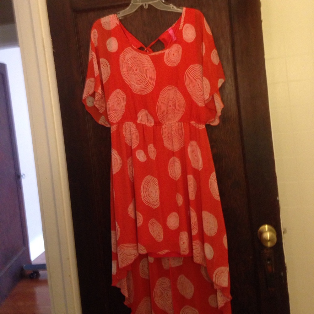 A beautiful high low burnt orange Trac dress.