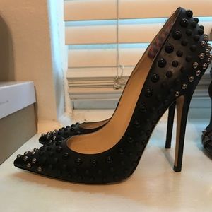 Jimmy Choo studded heels.