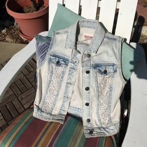 Adorable light denim jean vest with lace insets
