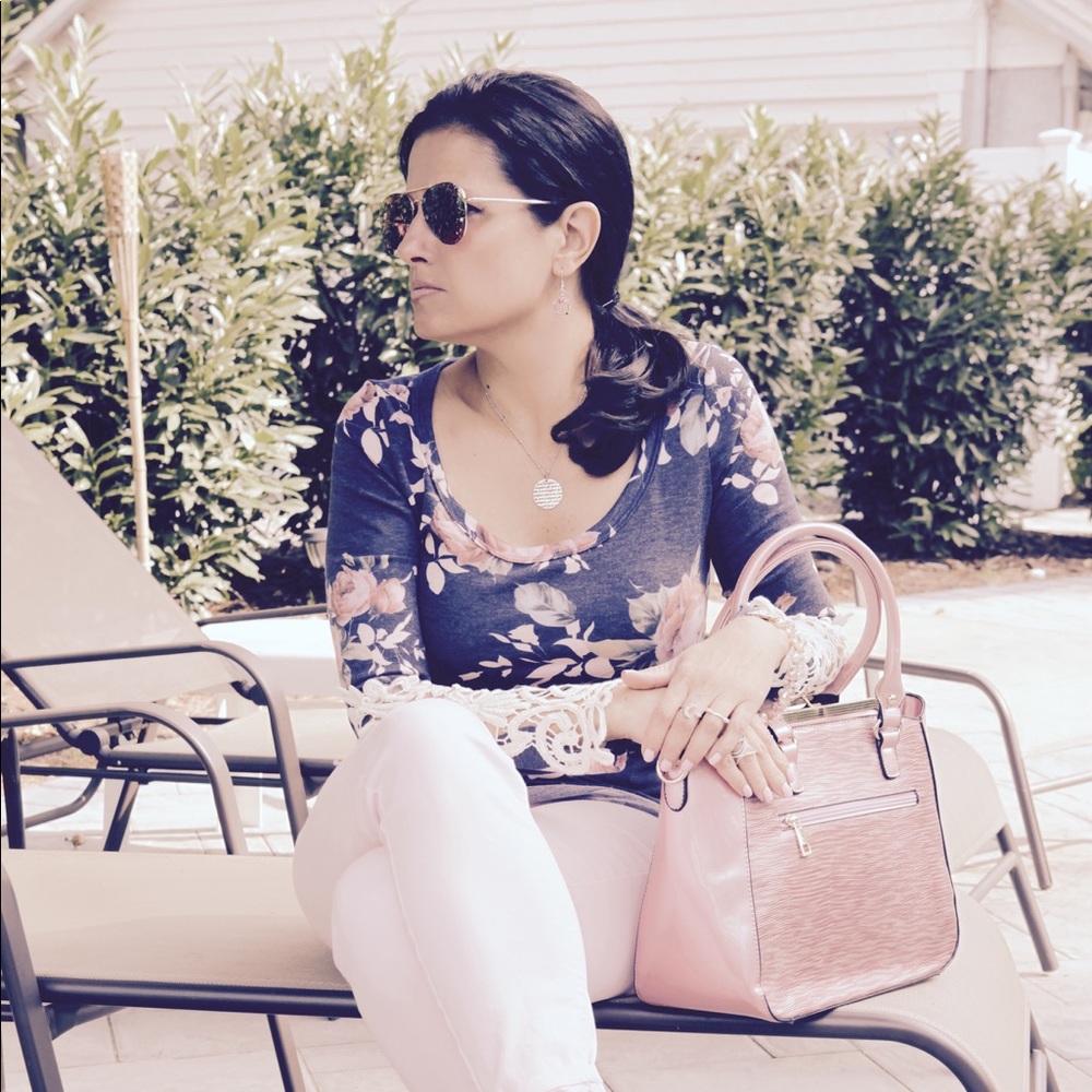 Navy floral jersey top with crochet sleeves.