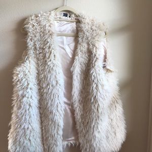 Ivory faux lamb vest in size M/L