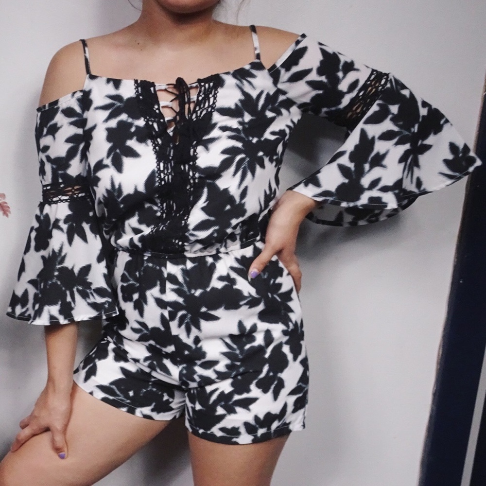 Romper With Bell Sleeves and Lace Up Chest
