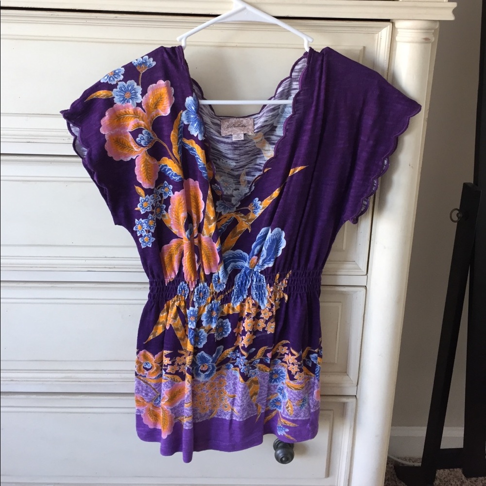 Purple patterned top with scalloped sleeves