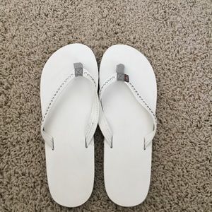 White rainbow flip flops