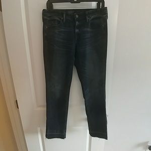 Mid rise straight leg denim in vintage dark wash.