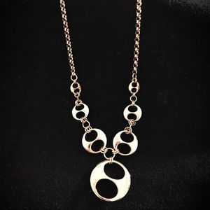 Technibond gold marine link necklace.