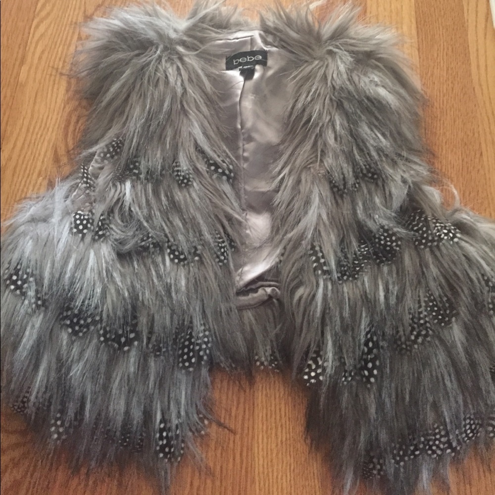 Funky grey and polka dot feather vest