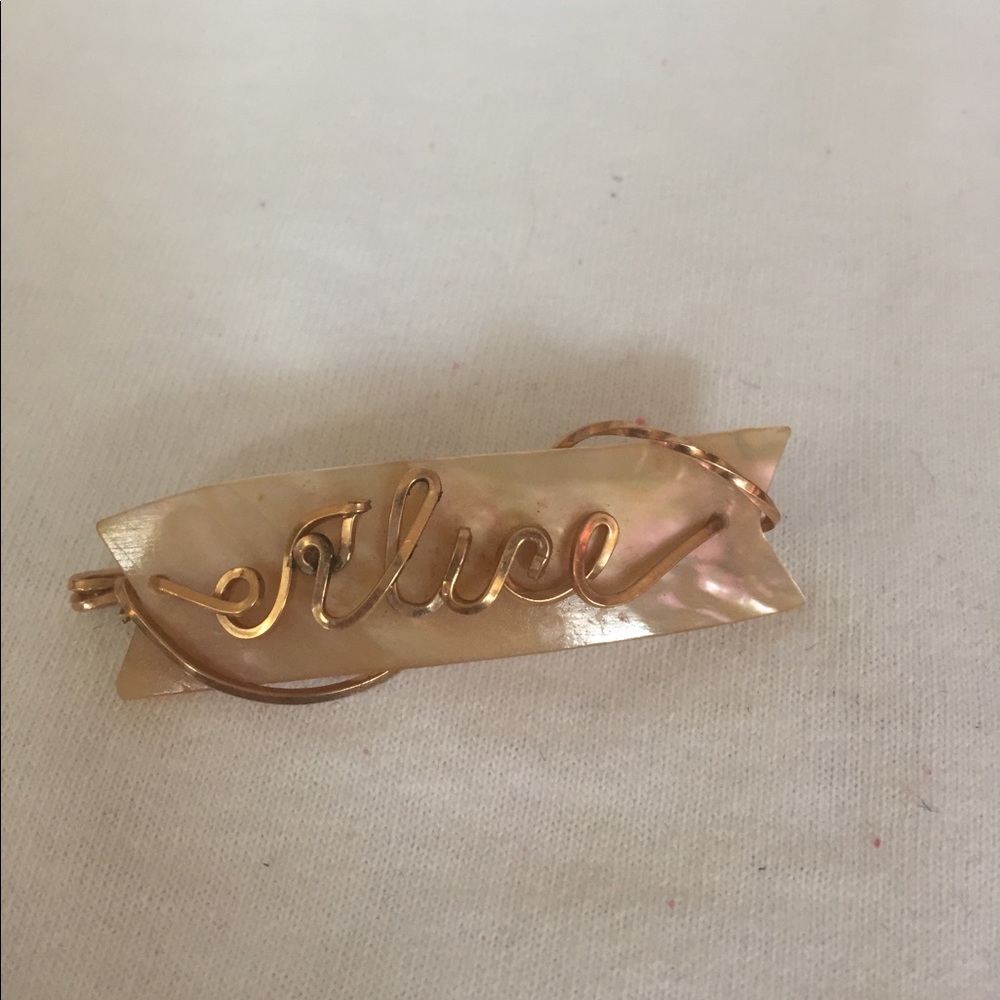 Vintage Alice mother of pearl pin