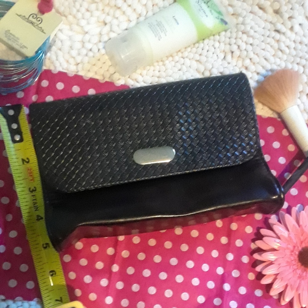 black textured vegan leather cosmetic bag