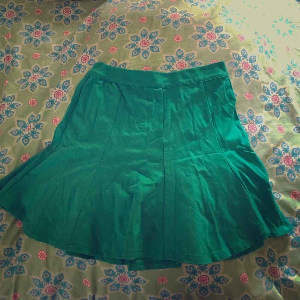 Aqua green skirt.