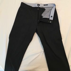 Gap “The Tailored” khakis in charcoal Grey
