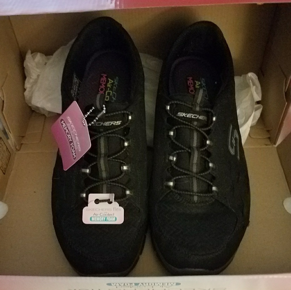 Skechers Flex black shoes.