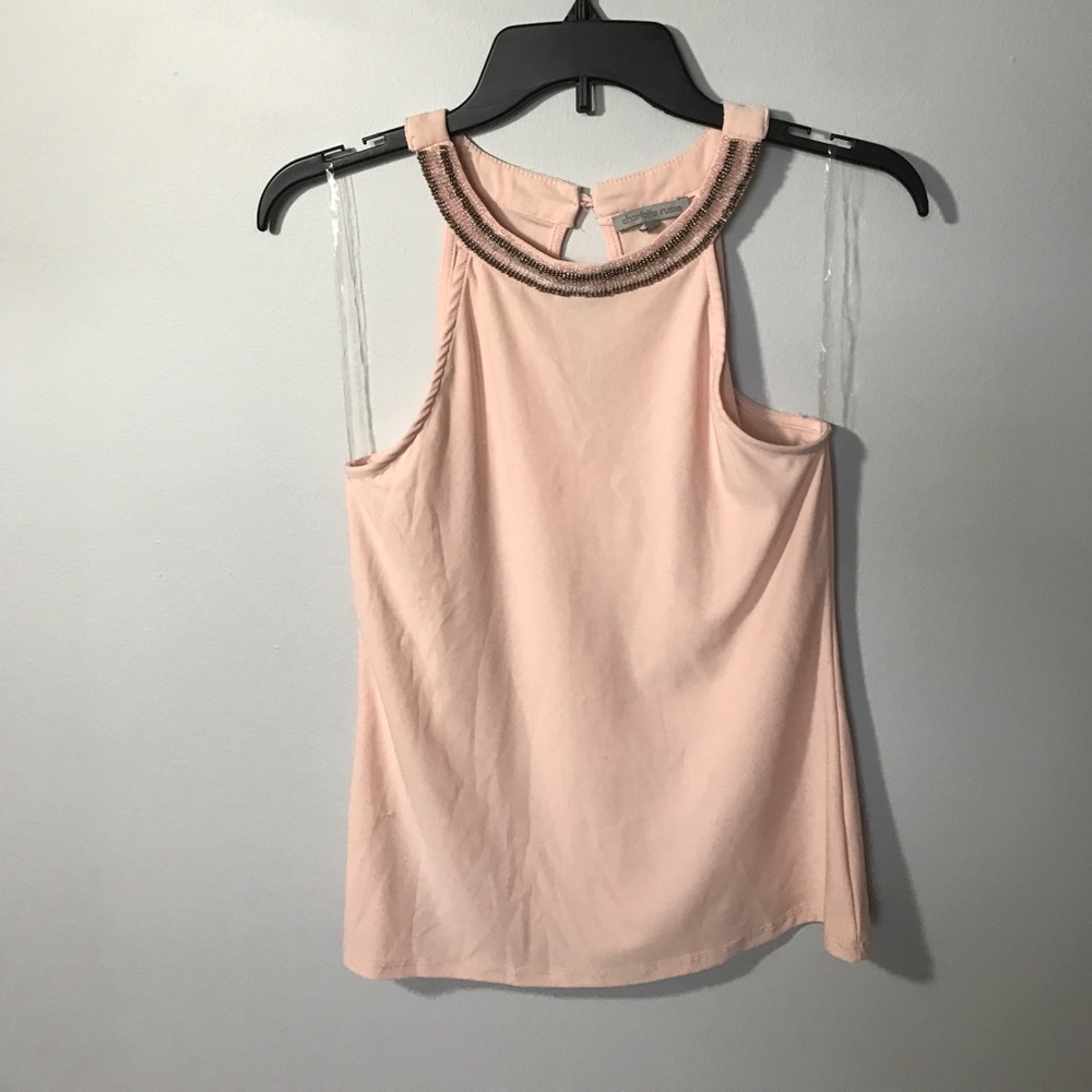 Light pink sleeveless blouse
