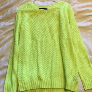 Neon yellow sweater, fits more like a medium!