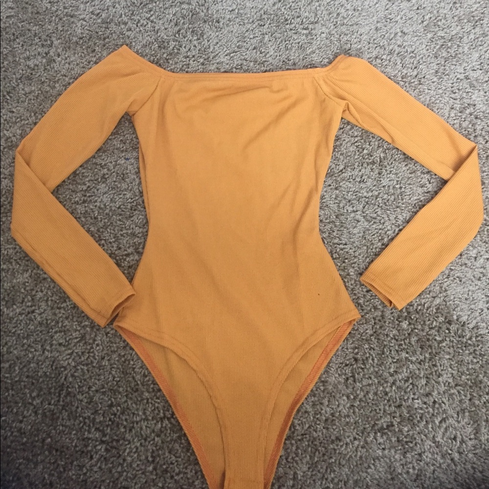 Yellow off the shoulder body suit